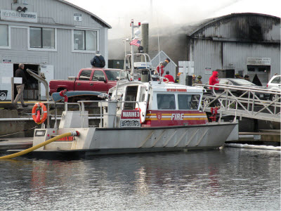 FireStorm 30 supplying water during a four-alarm fire New England Boatworks shipyard in Portsmouth, RI